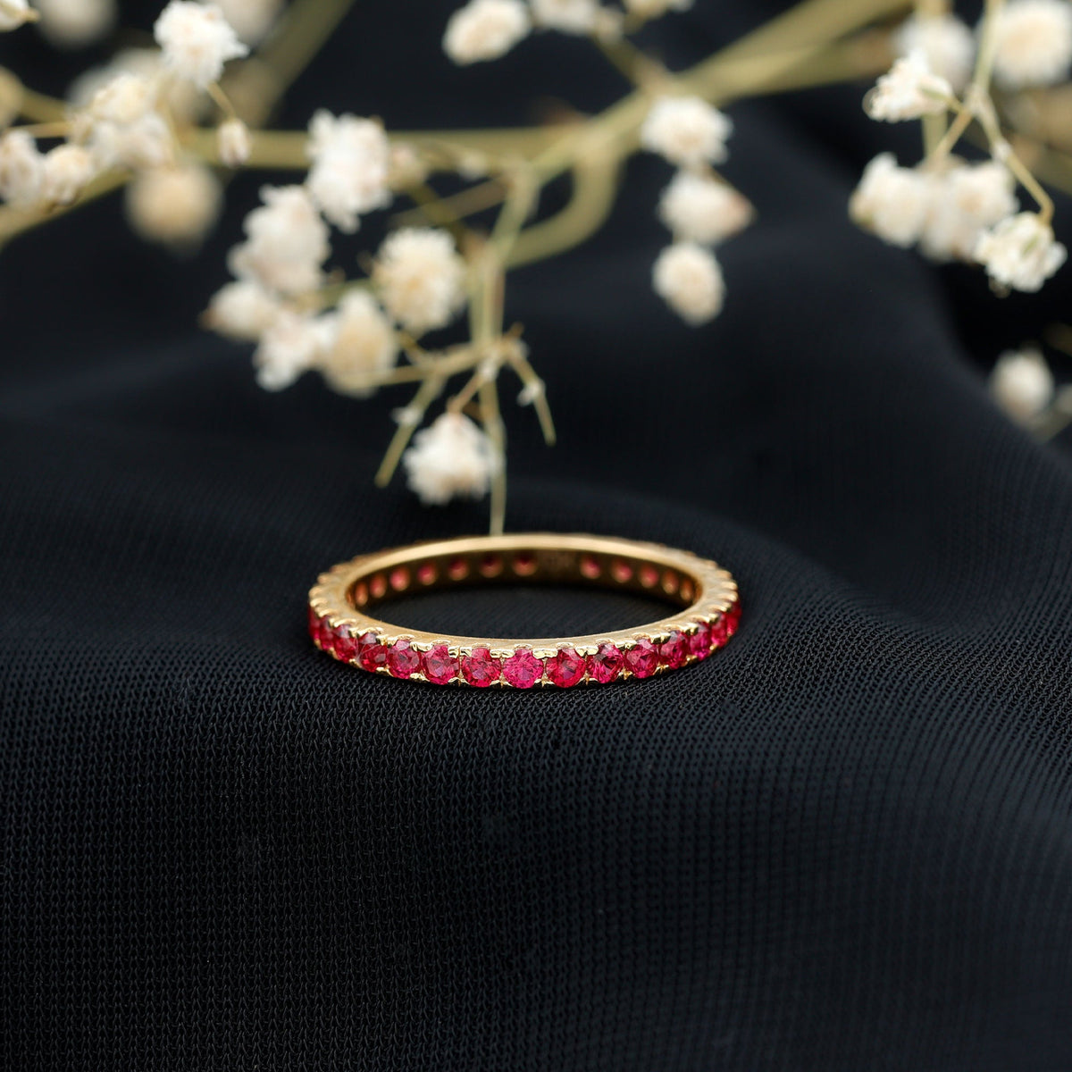 Rosec Jewels French pave set lab-grown ruby stackable eternity ring with sparkling ruby stones on a sleek band