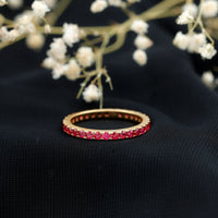 Rosec Jewels French pave set lab-grown ruby stackable eternity ring with sparkling ruby stones on a sleek band