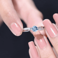 Real 0.8 Ct Aquamarine and Diamond Infinity Engagement Ring