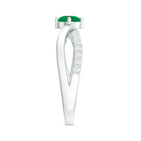 Rosec Jewels real emerald infinity promise ring with diamond, elegant silver band, and detailed gemstone setting.