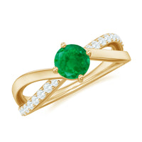 Real emerald infinity promise ring with diamond from Rosec Jewels, showcasing a silver band with emerald and diamond accents.