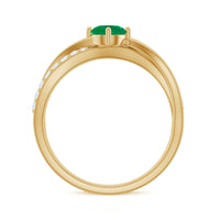 Real emerald infinity promise ring with diamond from Rosec Jewels, featuring a green emerald centerpiece and sparkling diamond accents.