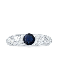 Vintage-style engagement ring with a 0.9 carat blue sapphire center stone and diamond accents, crafted by Rosec Jewels.