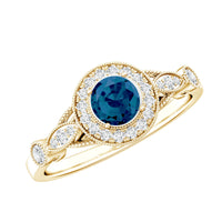 Antique engagement ring with 0.6 carat London Blue Topaz and diamond halo, featuring intricate vintage design by Rosec Jewels.