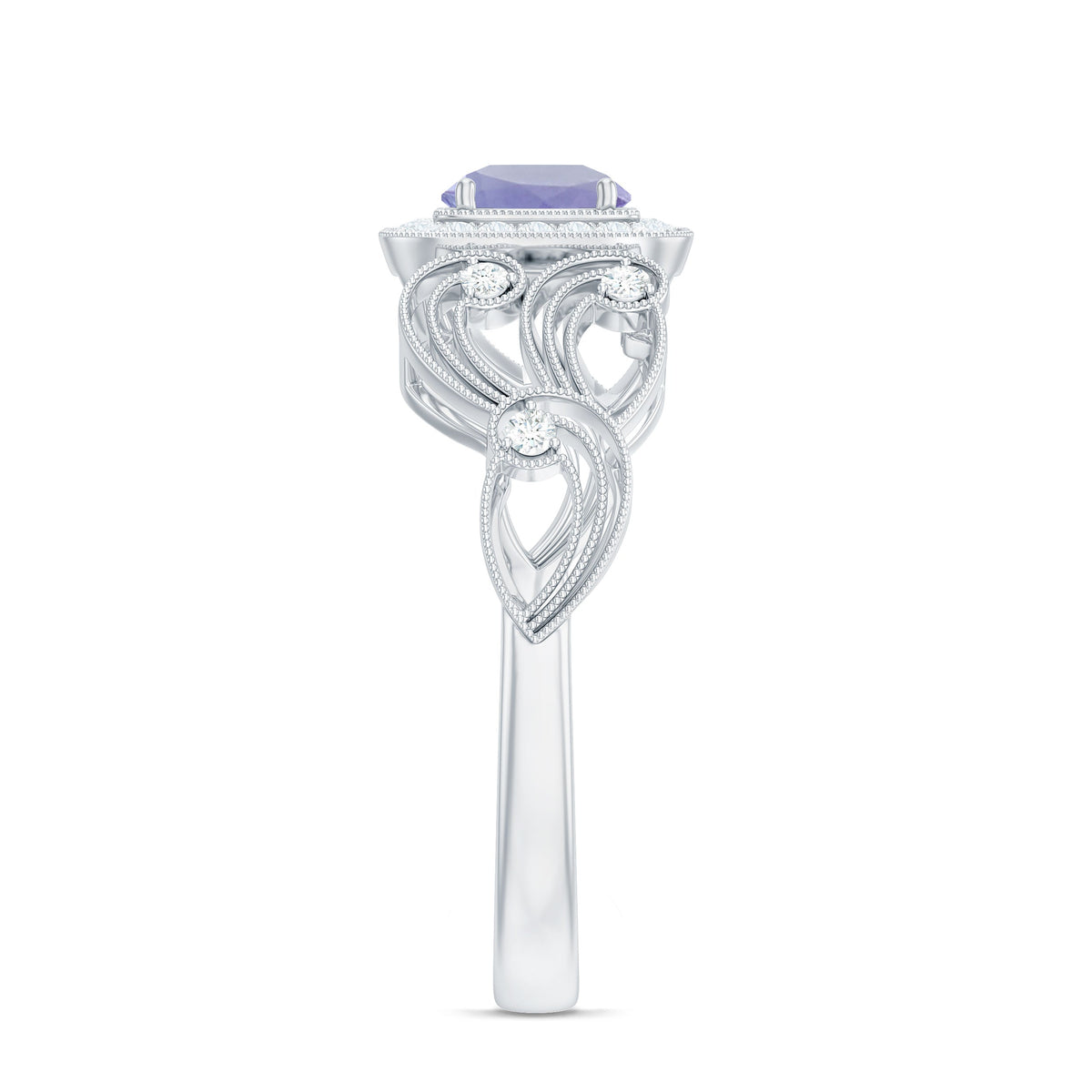 Vintage Tanzanite engagement ring with diamond halo, featuring intricate metalwork and sparkling gemstone from Rosec Jewels.