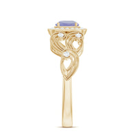 Vintage-style Tanzanite engagement ring with diamond halo by Rosec Jewels, showcasing a detailed setting and sparkling gemstones.