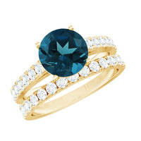 Two 2-carat round London Blue Topaz solitaire rings with moissanite bands, showcasing elegant jewelry designs by Rosec Jewels.