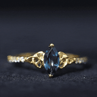 0.74 Carat Marquise Cut London Blue Topaz Celtic Engagement Ring with Diamond