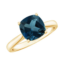 Solitaire cushion cut London Blue Topaz engagement ring with cathedral setting by Rosec Jewels, showcasing the blue gemstone and elegant band.