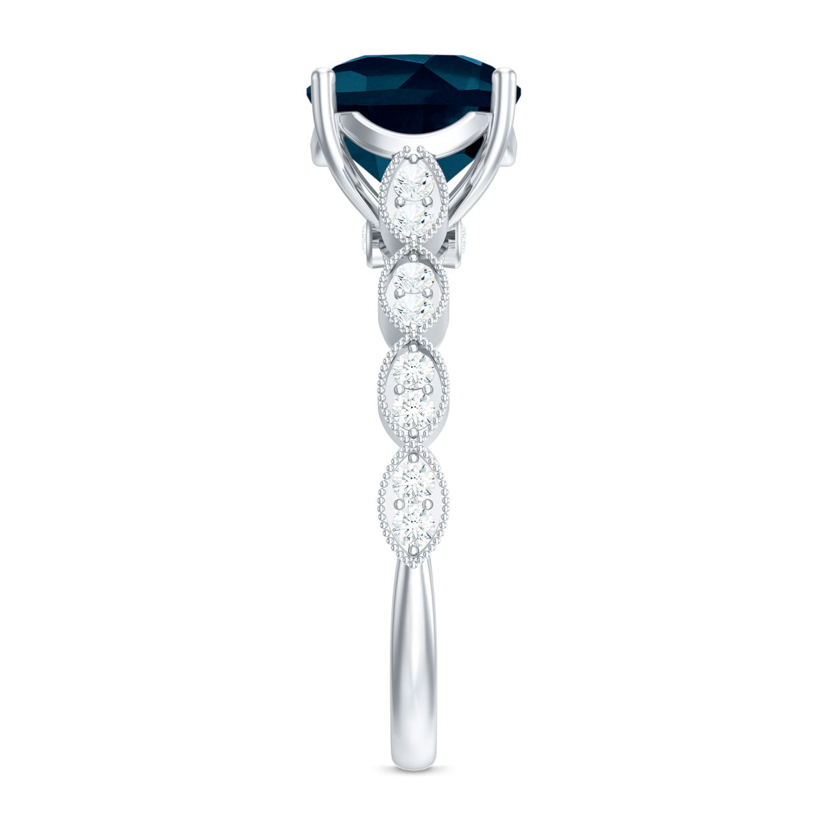 Vintage engagement ring featuring a cushion cut London Blue Topaz with surrounding diamonds, set in a Rosec Jewels ring design.