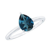 Pear-shaped 1 carat London Blue Topaz engagement ring with rose gold band from Rosec Jewels, featuring a sparkling gemstone centerpiece.
