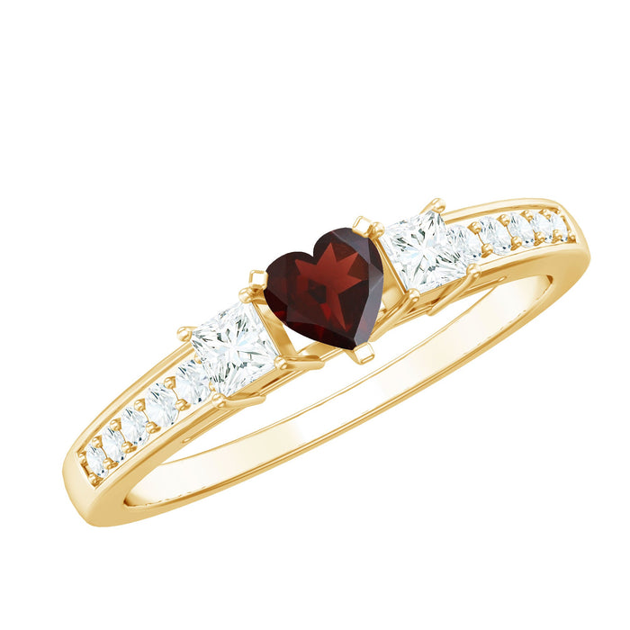 Heart-shaped natural garnet promise ring with diamond accents from Rosec Jewels, featuring a delicate silver band.