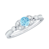 Natural aquamarine diamond engagement ring by Rosec Jewels featuring a sparkling aquamarine gemstone and diamond accents.