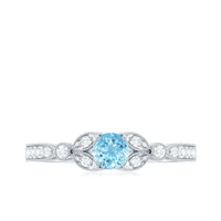 Natural aquamarine diamond engagement ring by Rosec Jewels featuring a radiant aquamarine gemstone and sparkling diamonds.