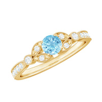 Natural aquamarine diamond engagement ring from Rosec Jewels featuring a sparkling aquamarine center stone and intricate band design.