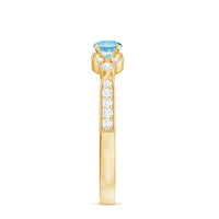 Natural aquamarine diamond engagement ring by Rosec Jewels featuring a central aquamarine gemstone and surrounding diamonds.