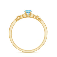 Natural aquamarine and diamond engagement ring by Rosec Jewels featuring a sparkling aquamarine stone and delicate band design.
