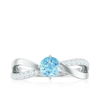 Genuine aquamarine engagement ring with diamond infinity shank, Rosec Jewels rings, featuring a central aquamarine gemstone and sparkling diamonds.
