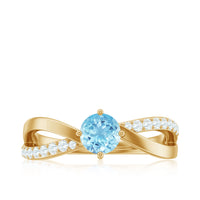 Genuine aquamarine engagement ring with diamond infinity shank from Rosec Jewels, showcasing the elegant blue gemstone and sparkling band.