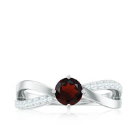 Natural garnet engagement ring with diamond infinity shank from Rosec Jewels, showcasing a stunning red gemstone and intricate band design.