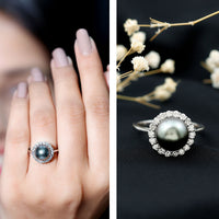 Natural Tahitian pearl and diamond halo engagement ring from Rosec Jewels featuring a central pearl surrounded by sparkling diamonds.
