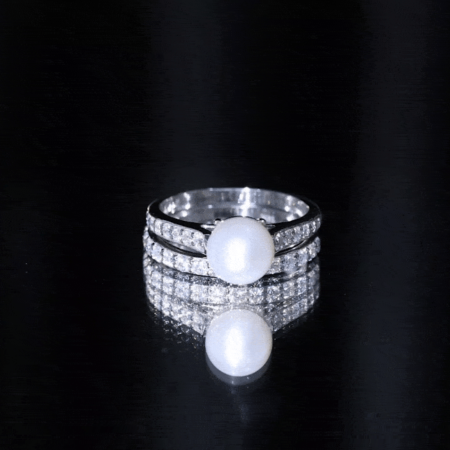 Natural white pearl and moissanite wedding bridal ring set by Rosec Jewels, featuring elegant rings with pearl and sparkling stones.