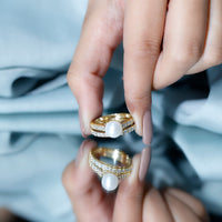 Natural white pearl wedding bridal ring set with moissanite featuring elegant band designs, crafted by Rosec Jewels.