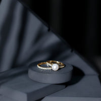 Natural white pearl and moissanite bridal ring set by Rosec Jewels featuring elegant rings with intricate designs.