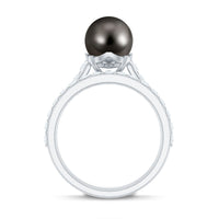 Elegant wedding ring set featuring a Tahitian pearl and moissanite stones, crafted by Rosec Jewels.