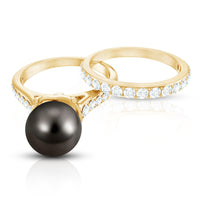 Elegant wedding ring set by Rosec Jewels featuring a 9.75 CT Tahitian pearl and sparkling moissanite stones.