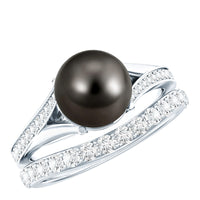 Tahitian black pearl wedding ring set with moissanite by Rosec Jewels, featuring elegant black pearls and sparkling gemstones.