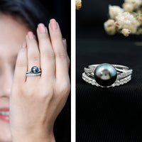 Designer Tahitian Black Pearl wedding ring set with Moissanite by Rosec Jewels featuring elegant rings with black pearls and sparkling gemstones.