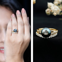 Tahitian black pearl and moissanite wedding ring set by Rosec Jewels, featuring elegant rings with black pearl and sparkling stones.