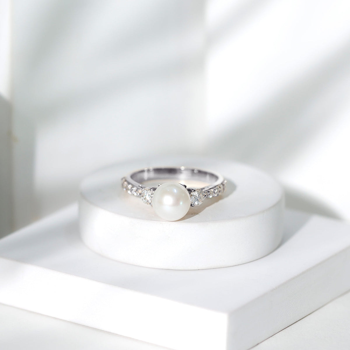 Rosec Jewels cultured 7.4 carat freshwater pearl engagement ring with sparkling moissanite, elegant and sophisticated jewelry piece