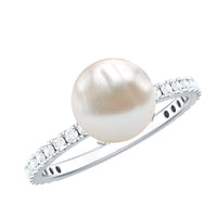 Rosec Jewels 7.4 Carat freshwater pearl solitaire engagement ring with a sparkling diamond on a sleek band.