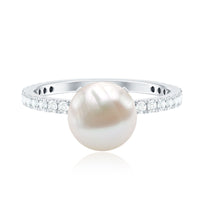 Rosec Jewels 7.4 carat freshwater pearl solitaire engagement ring with a diamond, showcasing a elegant pearl and sparkling band.