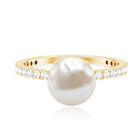 Rosec Jewels 7.4 Carat freshwater pearl solitaire engagement ring with diamond, featuring a sleek gold band and elegant design.
