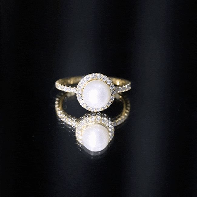 Cultured 7.4 carat freshwater pearl diamond engagement ring with halo setting by Rosec Jewels, featuring a detailed silver band.