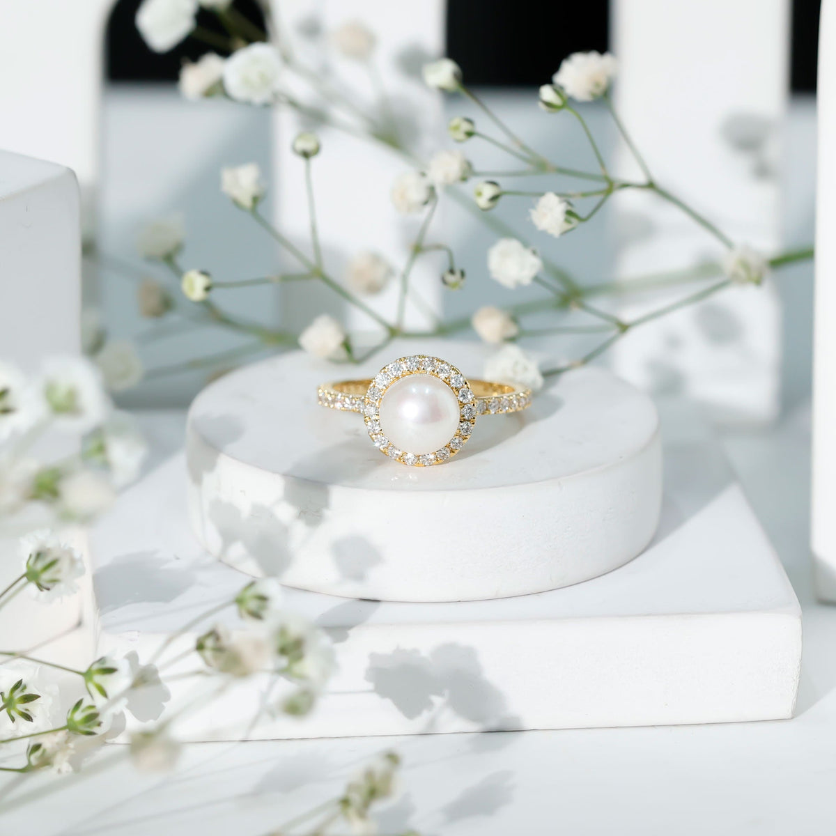 Rosec Jewels cultured 7.4 carat freshwater pearl diamond engagement ring with halo setting, showcasing elegant jewelry design.