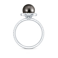 Halo engagement ring by Rosec Jewels featuring a Tahitian pearl center stone surrounded by sparkling diamonds.