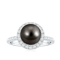 Halo engagement ring by Rosec Jewels featuring a Tahitian pearl surrounded by sparkling diamonds.