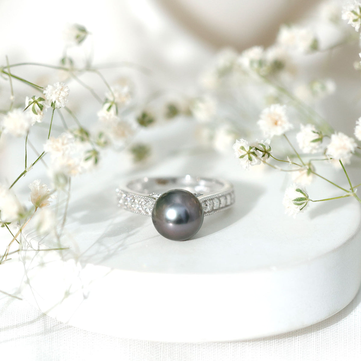 Natural Tahitian pearl cathedral engagement ring with diamond side stones, elegant Rosec Jewels ring showcasing a lustrous pearl.