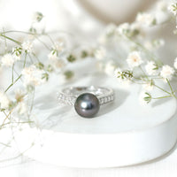 Natural Tahitian pearl cathedral engagement ring with diamond side stones, elegant Rosec Jewels ring showcasing a lustrous pearl.