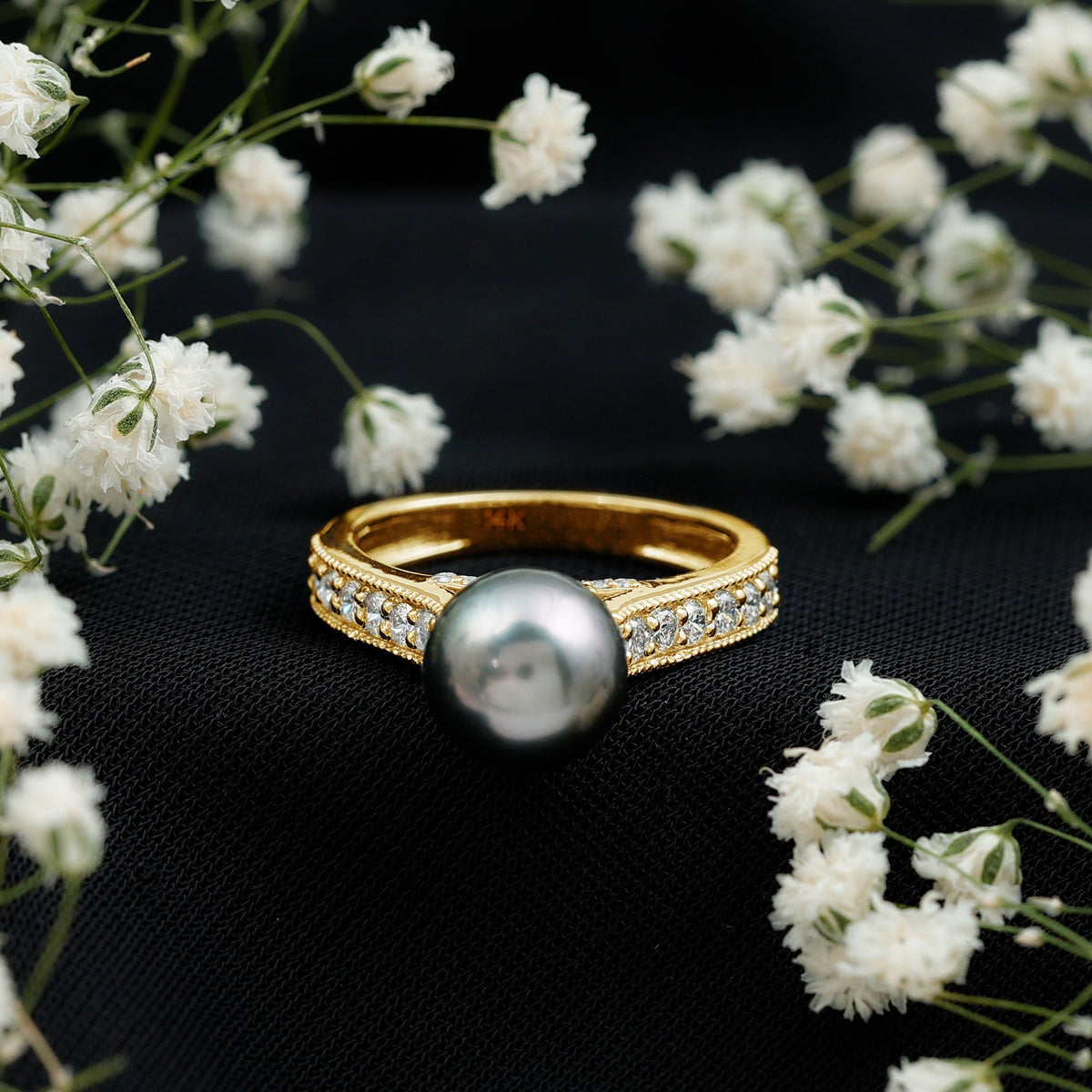Natural Tahitian Pearl cathedral engagement ring with diamond side stones from Rosec Jewels, featuring a prominent black pearl centerpiece.