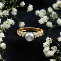 Natural Tahitian Pearl cathedral engagement ring with diamond side stones from Rosec Jewels, featuring a prominent black pearl centerpiece.