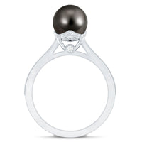 Tahitian black pearl cathedral engagement ring with diamonds by Rosec Jewels, showcasing a 7.5-carat pearl set in a detailed platinum band.