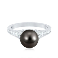 Tahitian black pearl cathedral engagement ring with diamonds from Rosec Jewels, showcasing a 7.5-carat black pearl and sparkling diamond accents