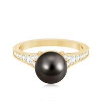 Tahitian black pearl cathedral engagement ring with diamonds by Rosec Jewels, featuring a 7.5-carat pearl and sparkling accents.