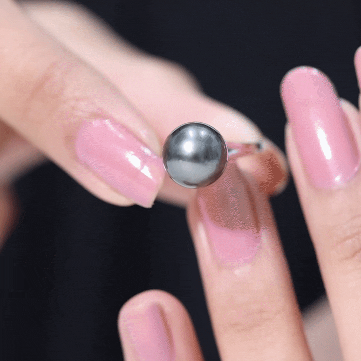 7.5 carat genuine Tahitian black pearl cathedral engagement ring with split shank, featuring intricate gold band design.