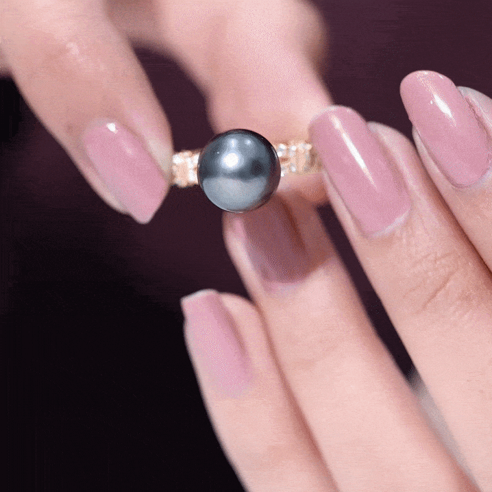 7.5 carat genuine black pearl and diamond engagement ring from Rosec Jewels, showcasing a luxurious yellow gold band and intricate design.